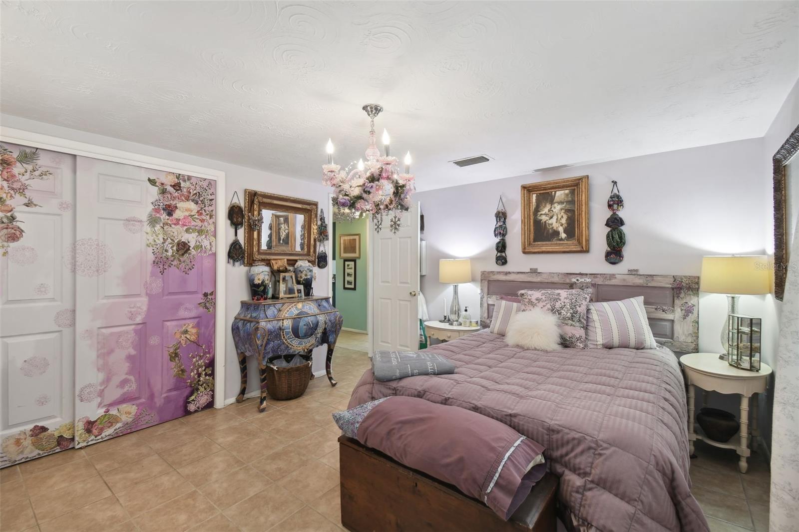 Master bedroom with custom painted closet doors