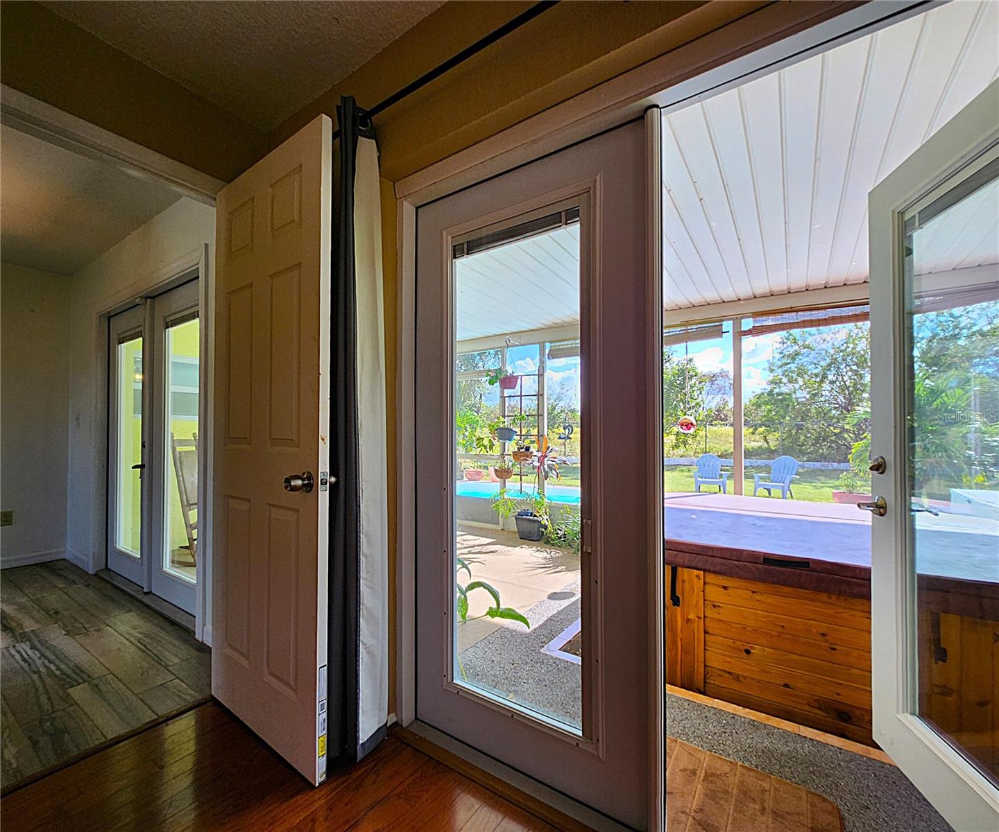 Master Bedroom doors leading to the lanai & hot spa