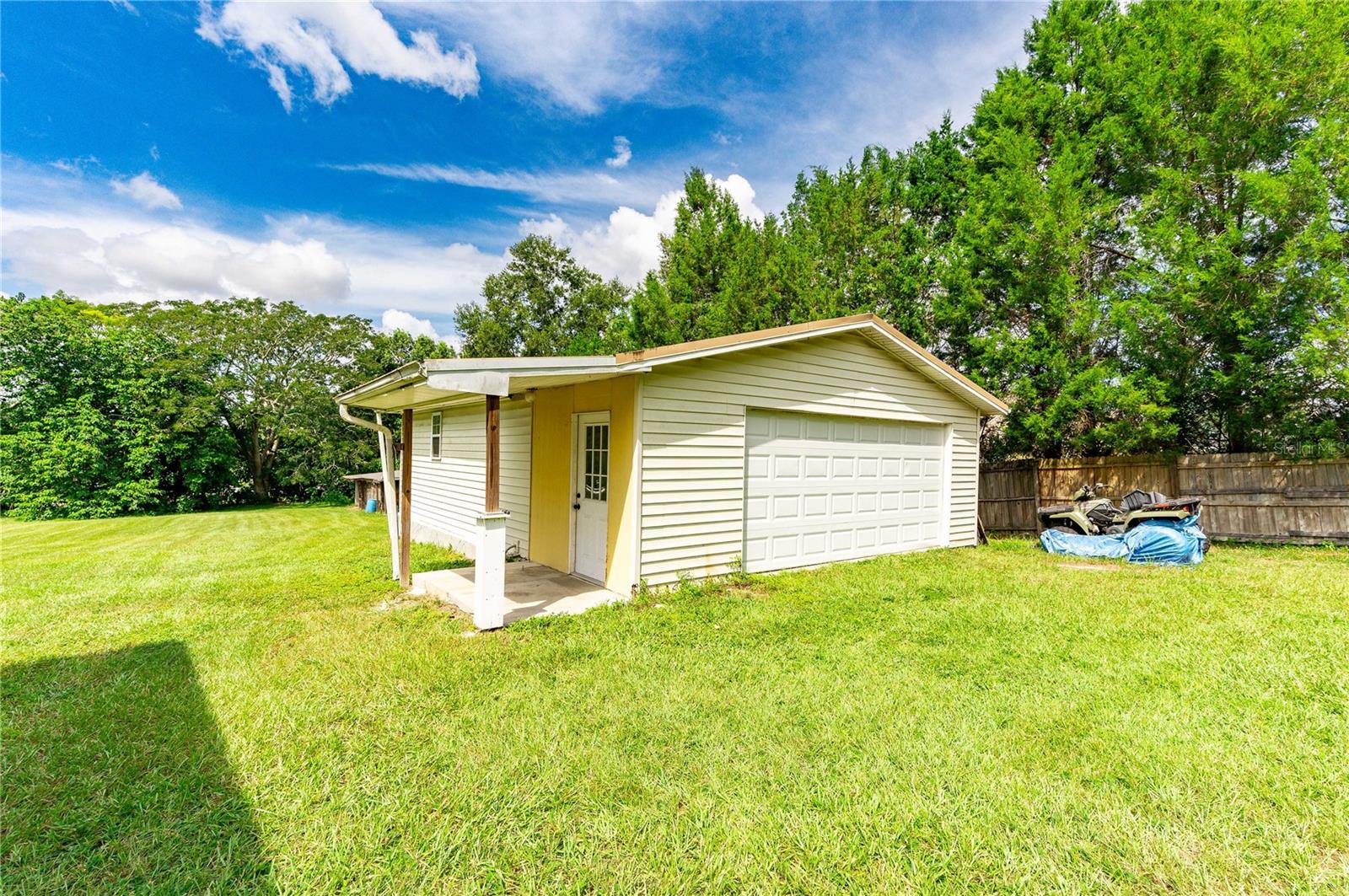 Detached two car garage for storage.