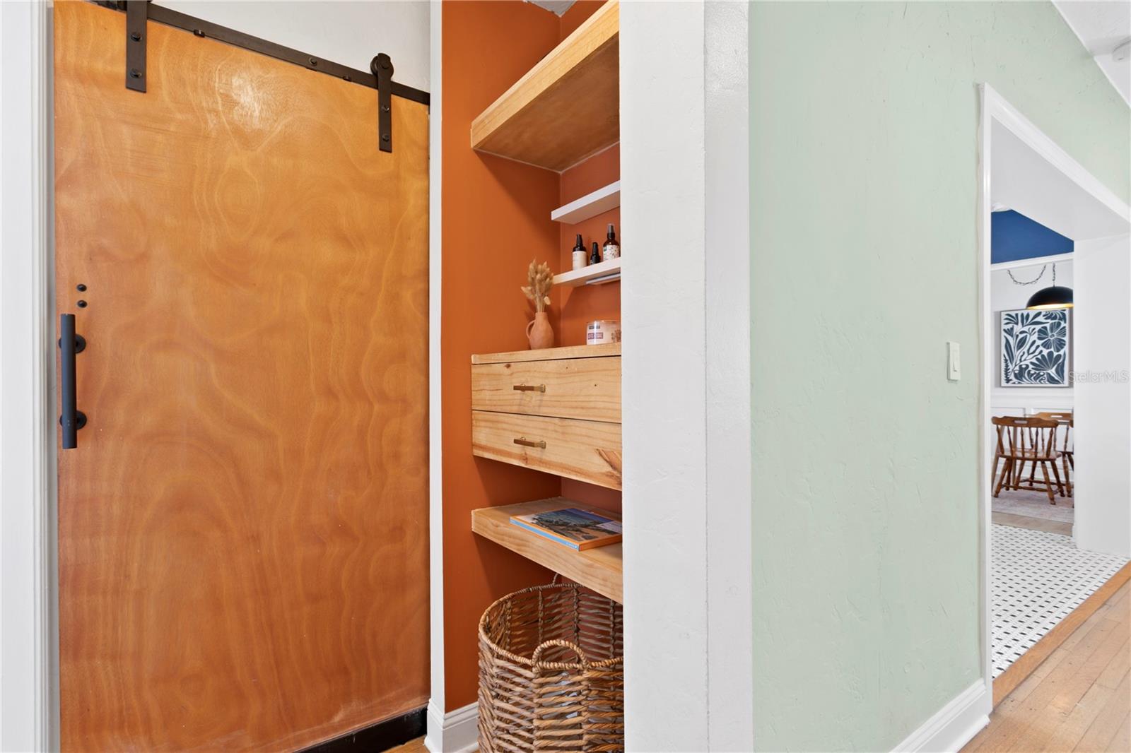 Barn door to guest bathroom