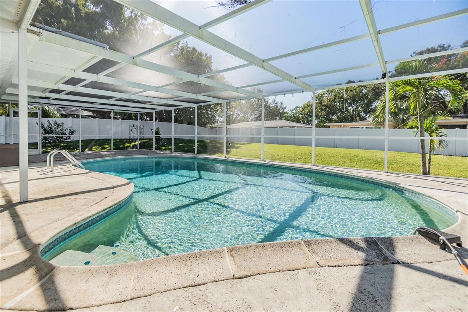 Pool and large fenced in back yard