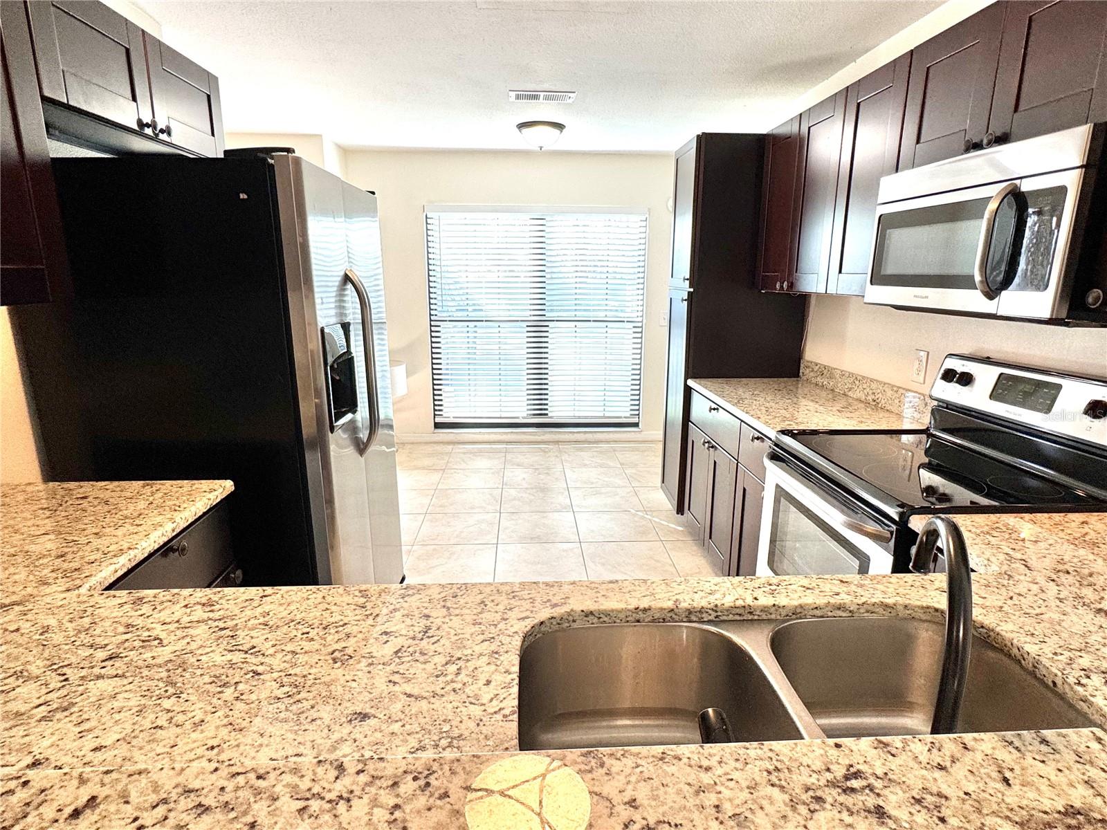 Granite counters and stainless steel appliances