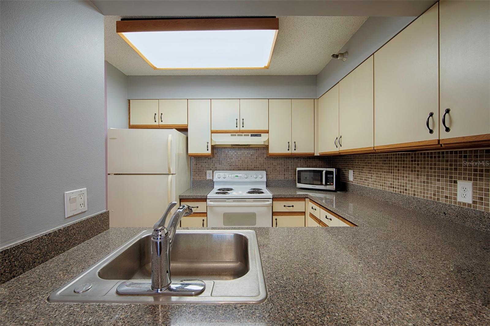 Kitchen opens up into dining area