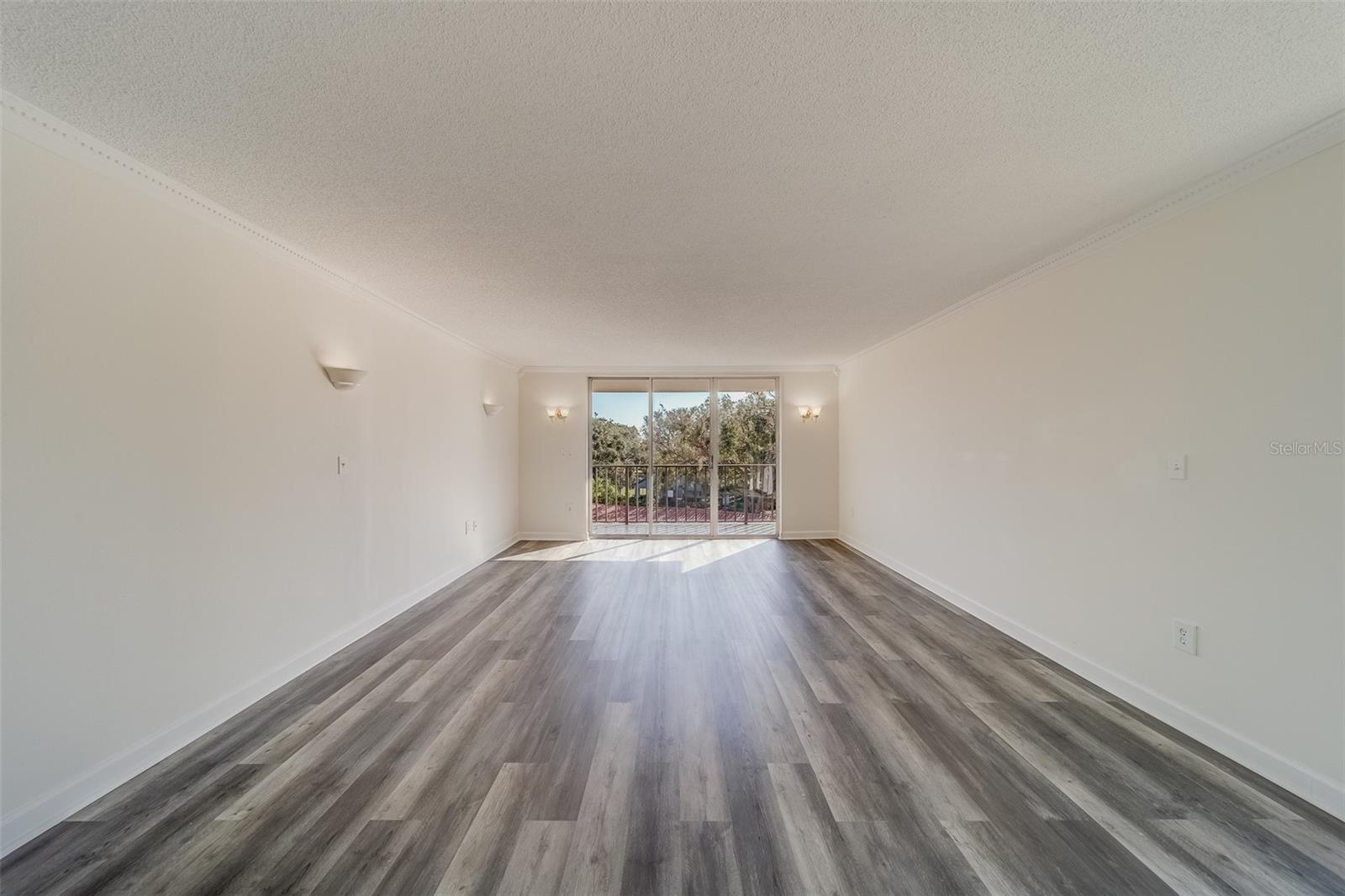 Living Room with Updated LPV and 2 Balconies