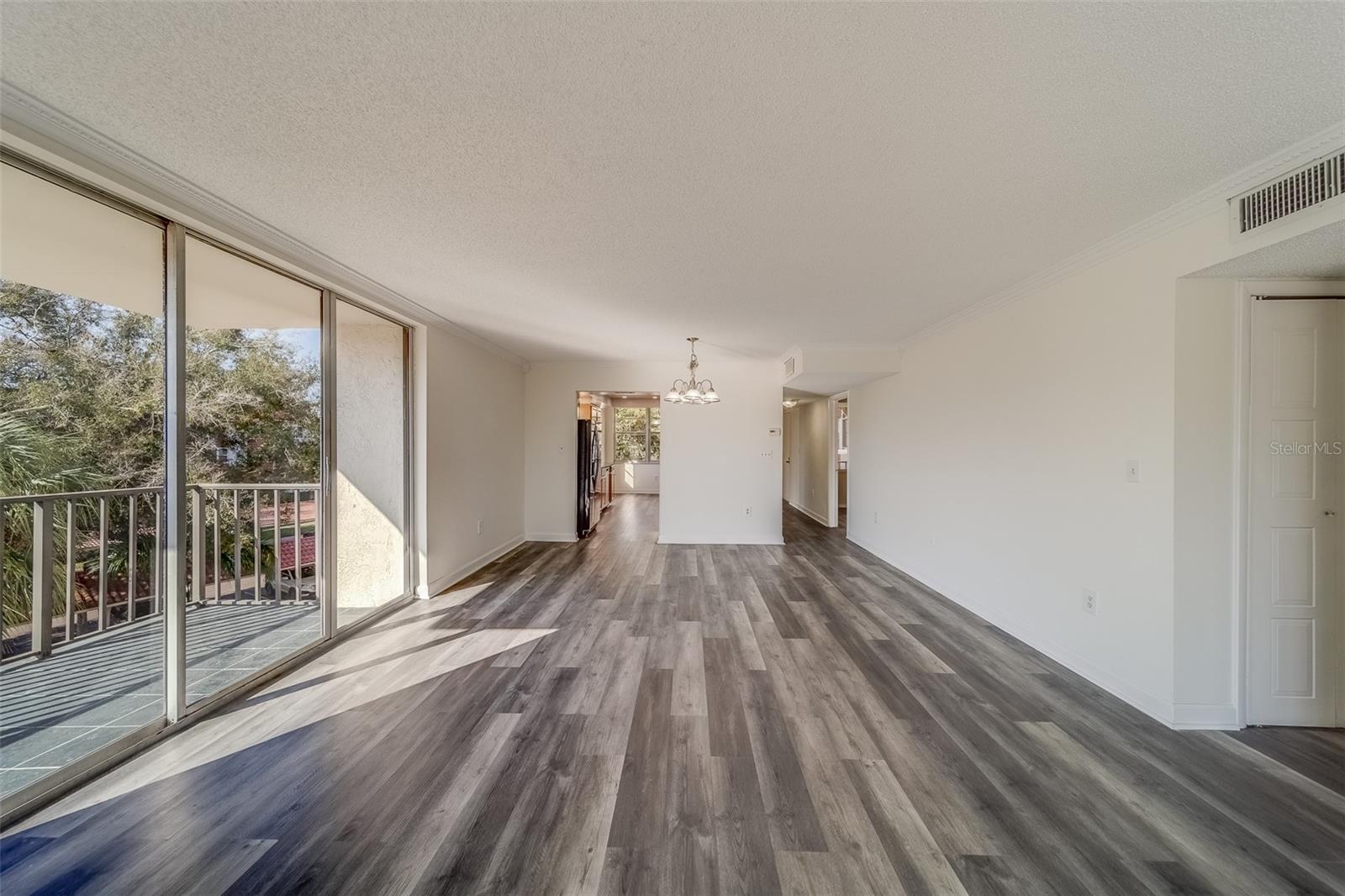 Living Room with Updated LPV and 2 Balconies