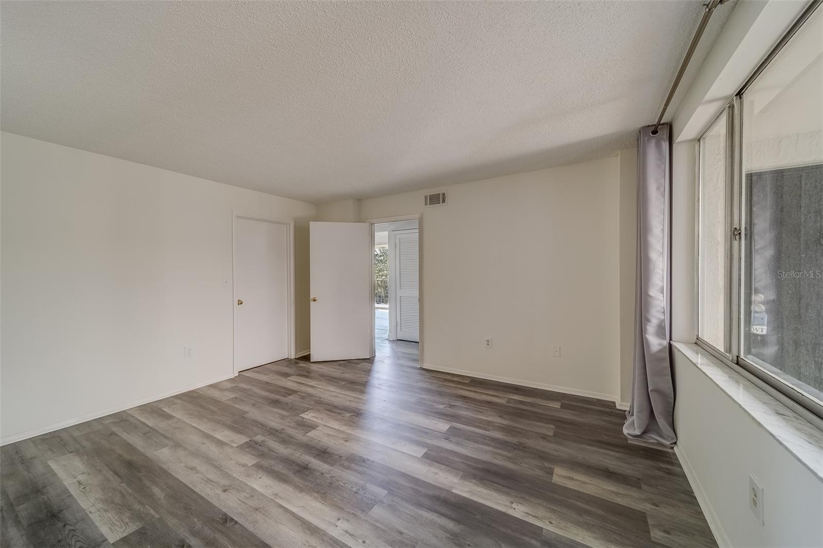 1st Guest Bedroom with walk-in closet