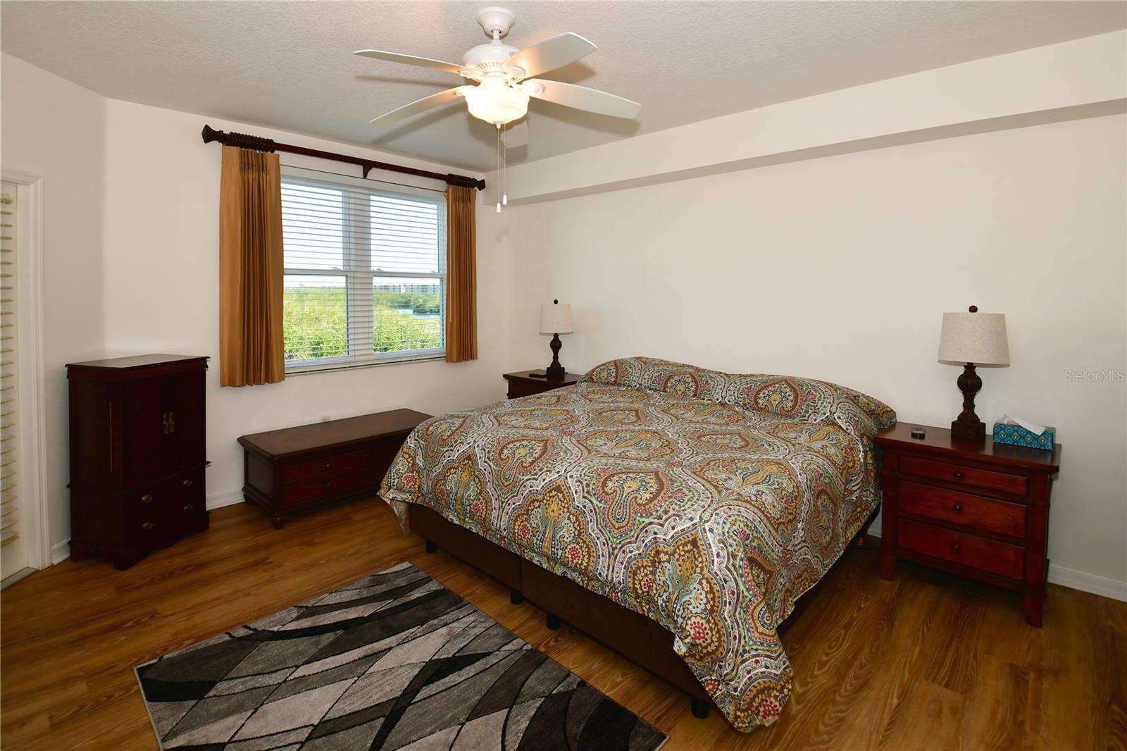 The large Primary Bedroom also enjoys great water views ...