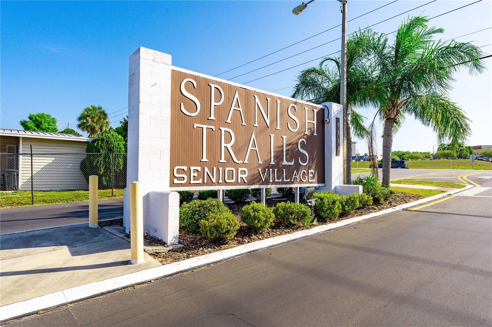 Spanish Trails Village is a gated 55+ own your land community.