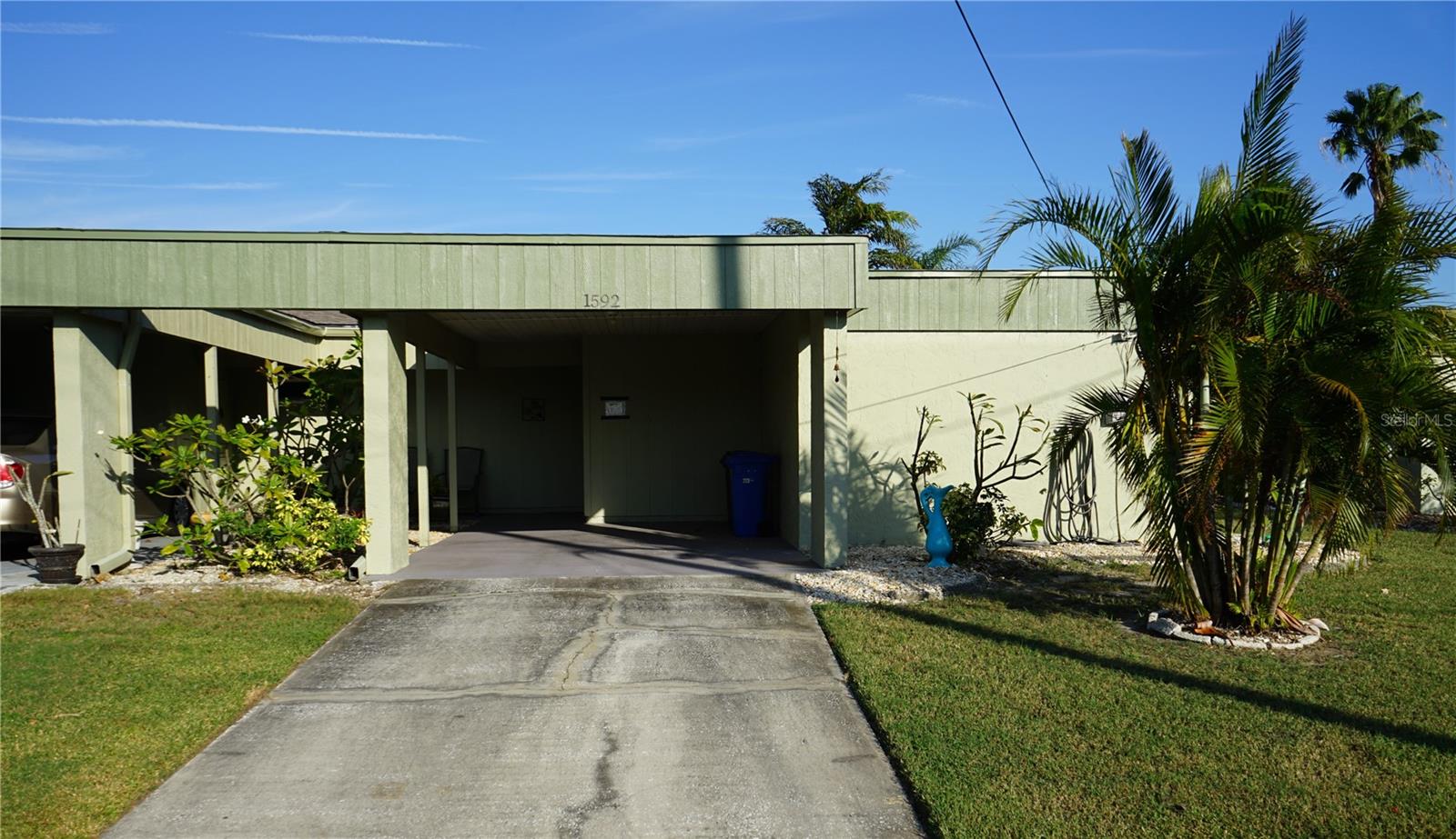 park under roof and long driveway