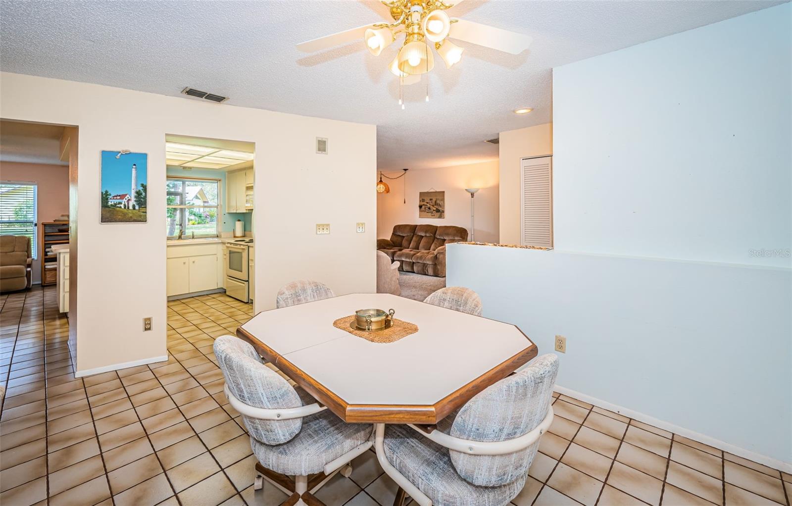 Dining room, view of kitchen, family & living rooms