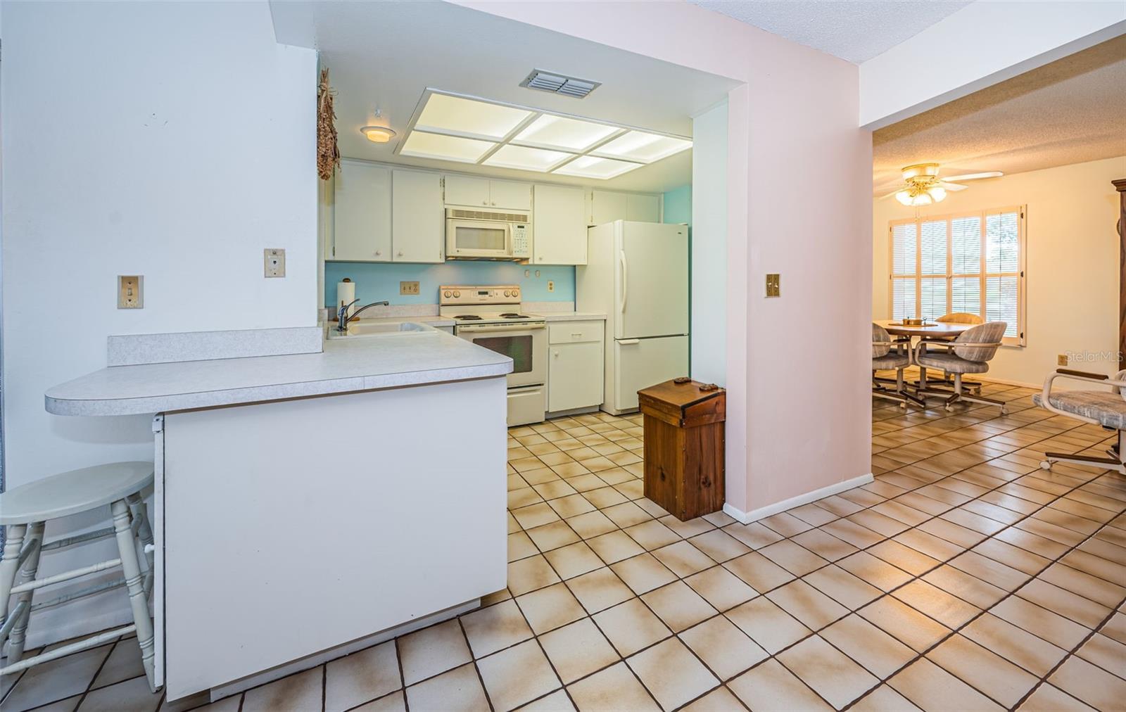 Family room view to kitchen & dining room