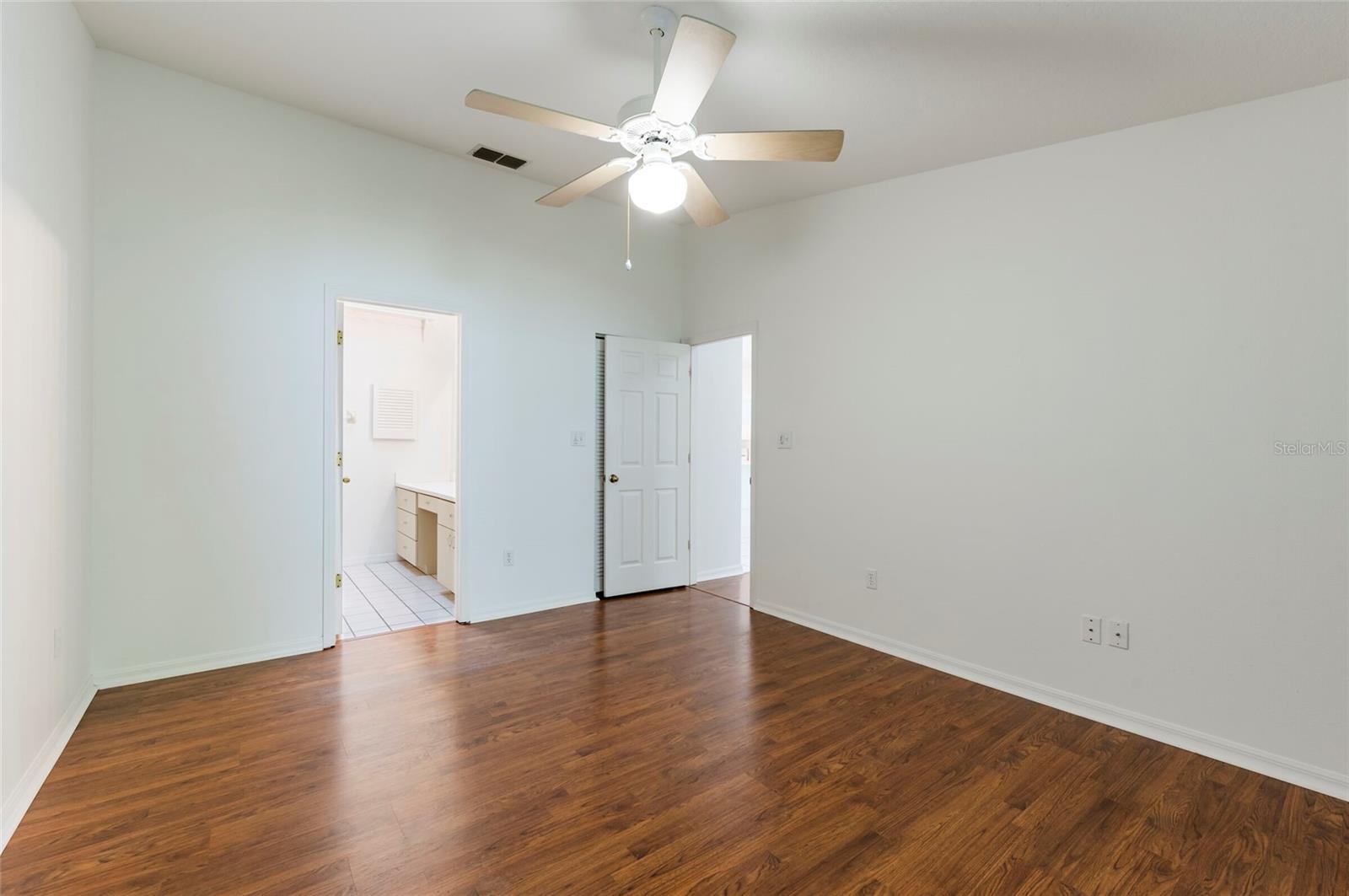 Primary Bedroom with Walk-in Closet and Ensuite Bathroom