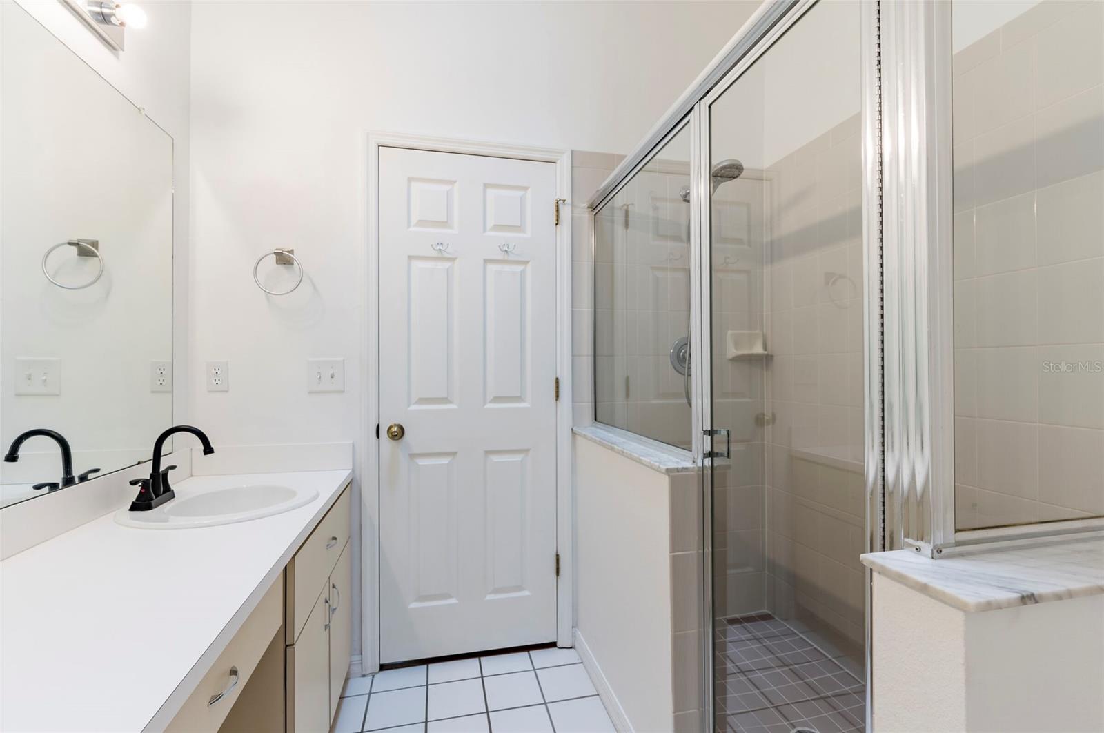 Primary Bathroom with Double Vanity and Large Walk-in Shower