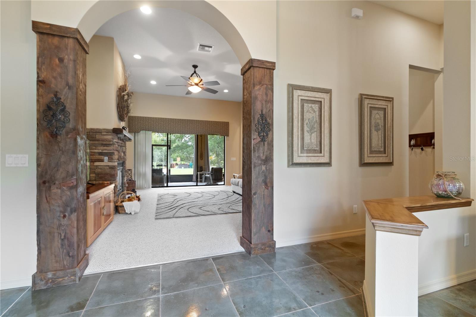 custom stained columns leading into your living room