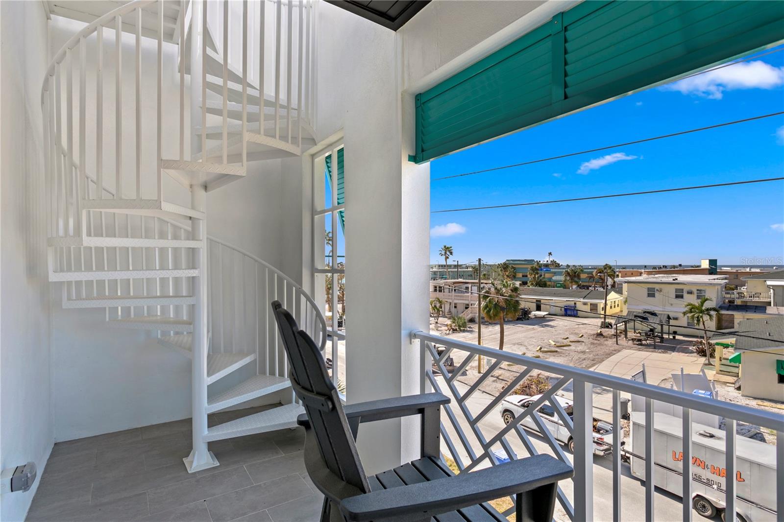 Nice, wide spiral staircase leading to private rooftop terrace and hot tub