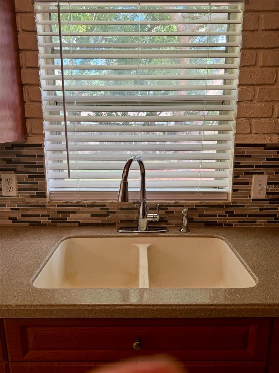 Nice Counter-Tops, Sinks, New Faucet in the Kitchen