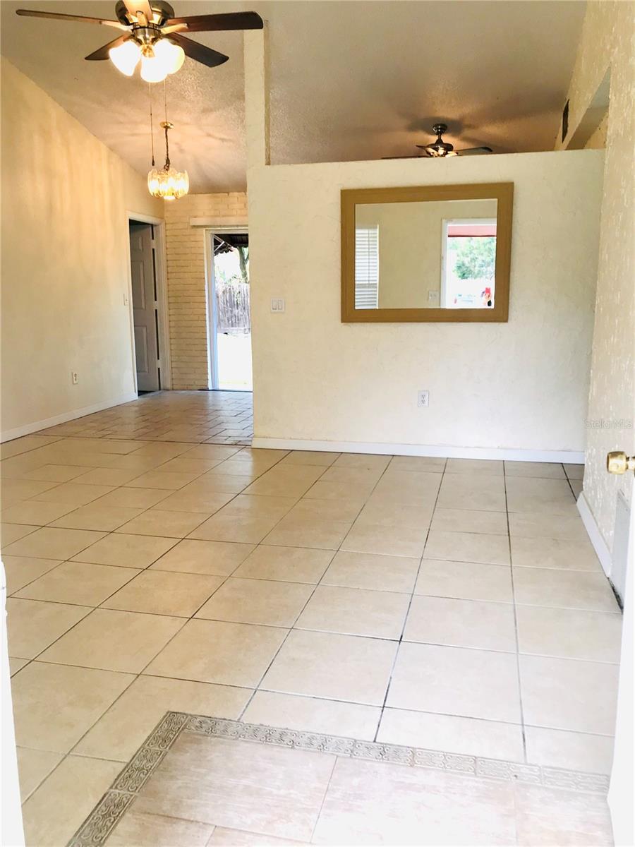 Living Room To the Dining Area and Kitchen