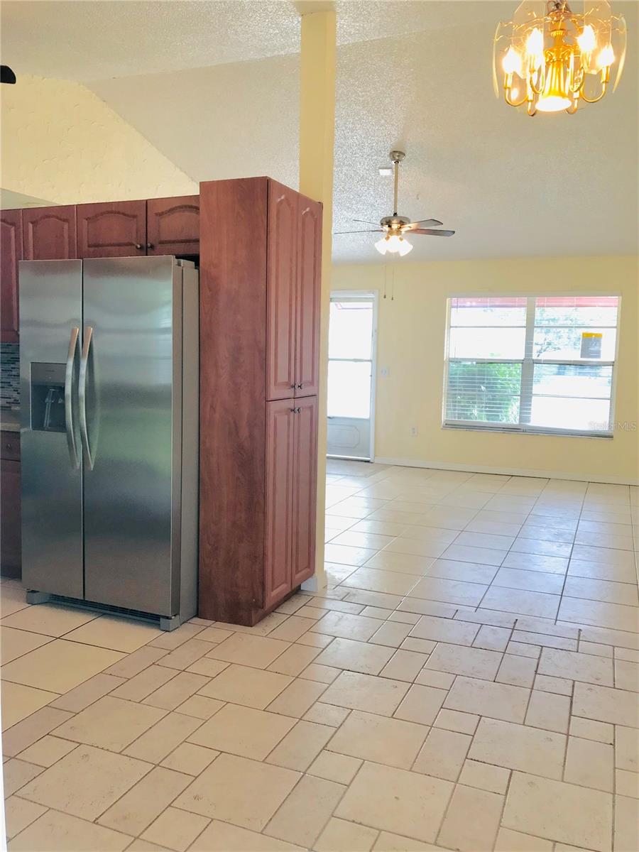 From Living Room to Dining Area and Kitchen