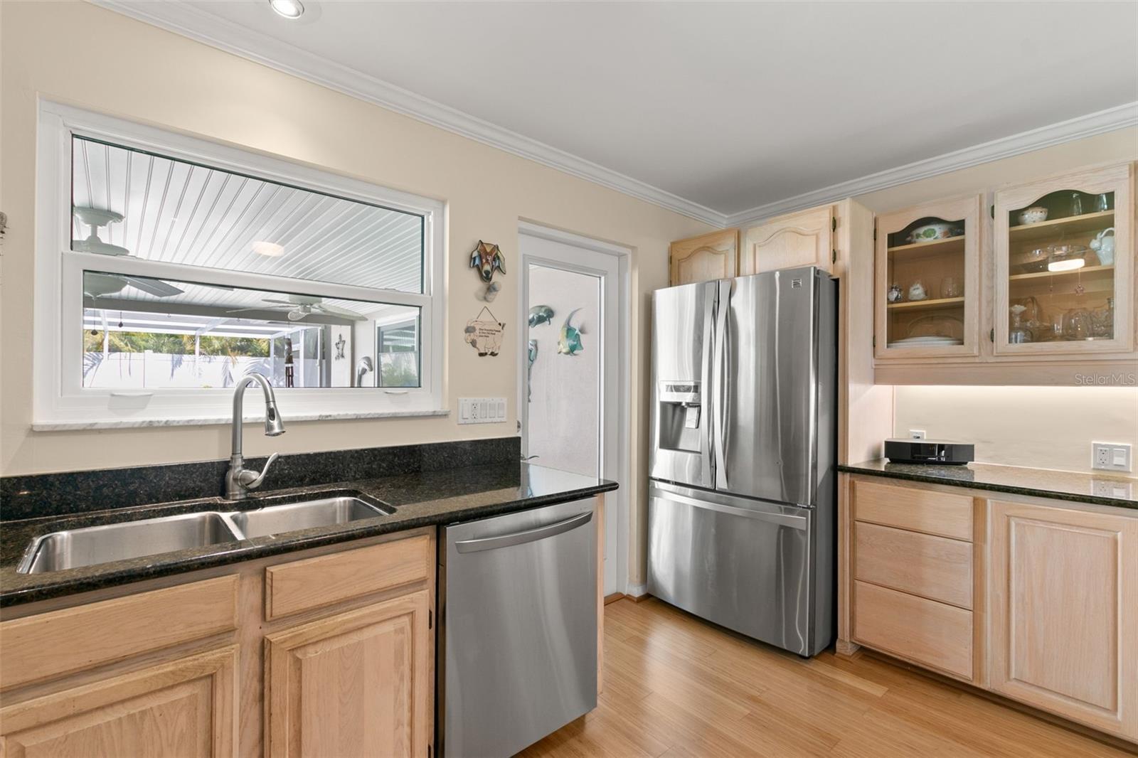 The Kitchen Overlooks the Pool and Lanai