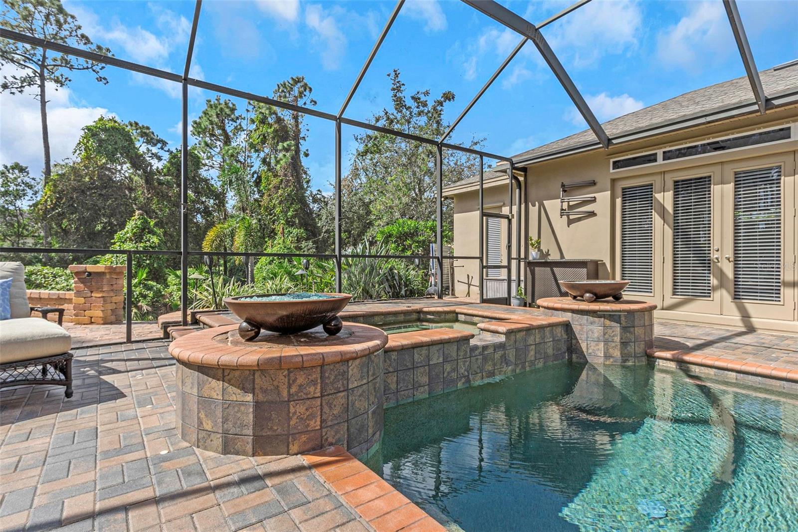 Heated pool and spa with 2 gas fire bowls