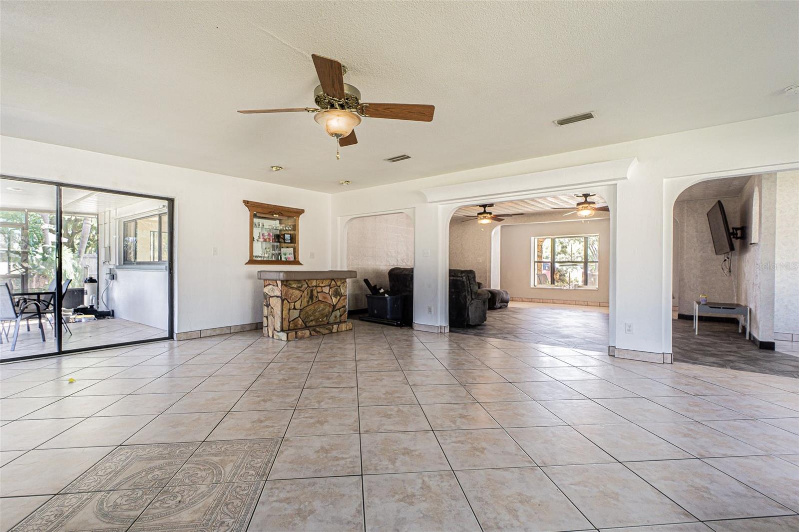 Family room looking towards the living room and foyer beyond.