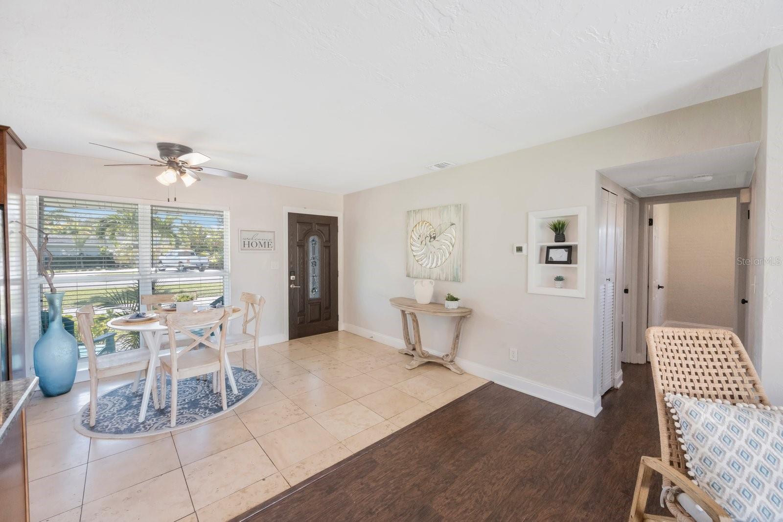 Travertine Tile and Laminate Plank Flooring