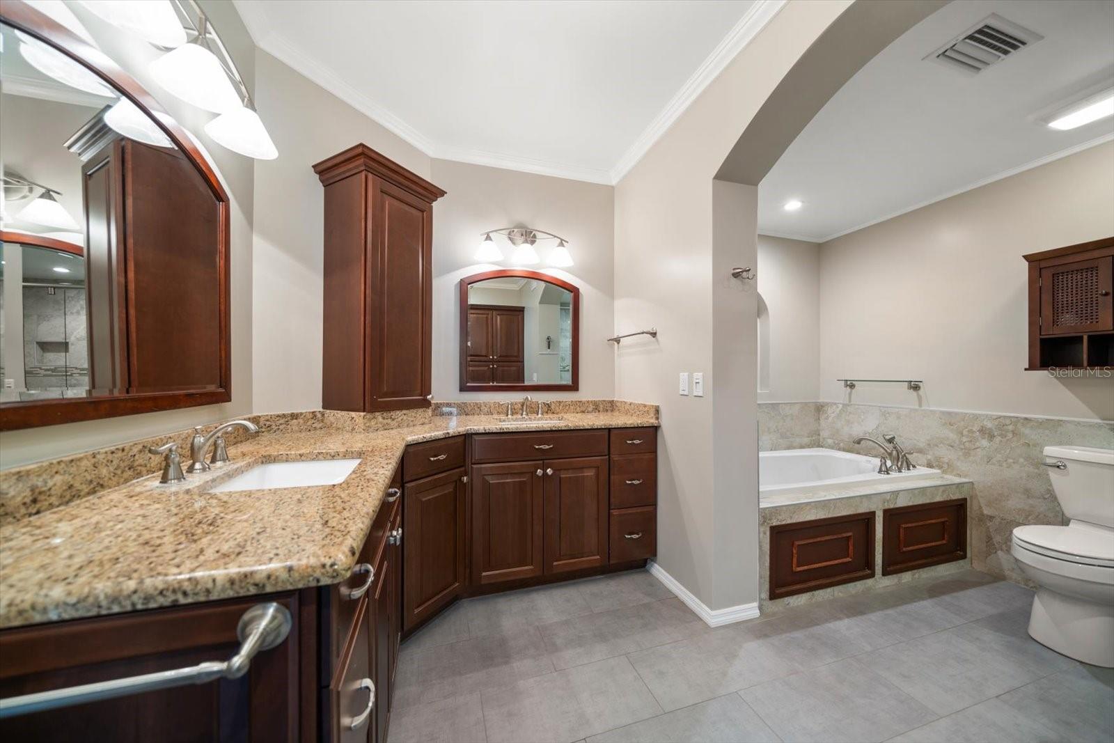 Primary Bathroom with seperate dual vanities & high countertops