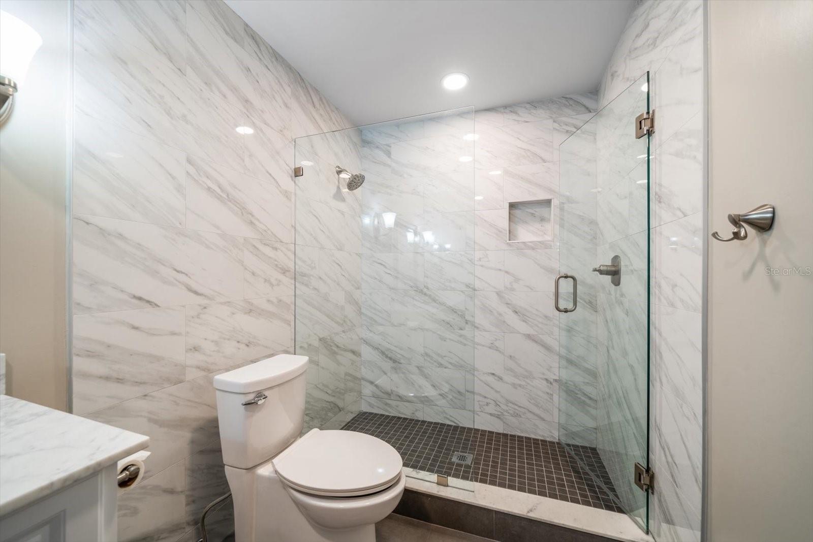 Guest Bathroom with large walk in shower