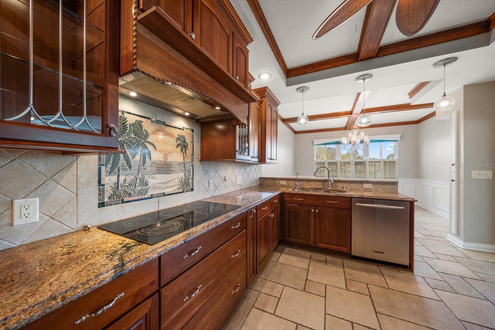 Kitchen featuring beautiful tropical tile backsplash