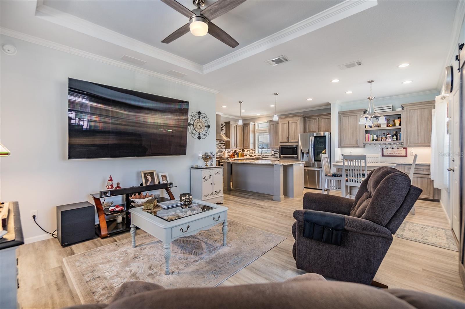 Tray ceiling accents this Spacious Great Room in this OPEN floorplan