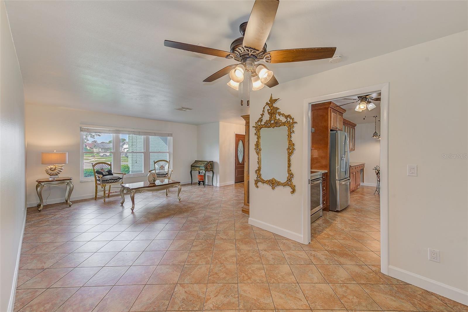 View of living room/dining room with entrance to kitchen