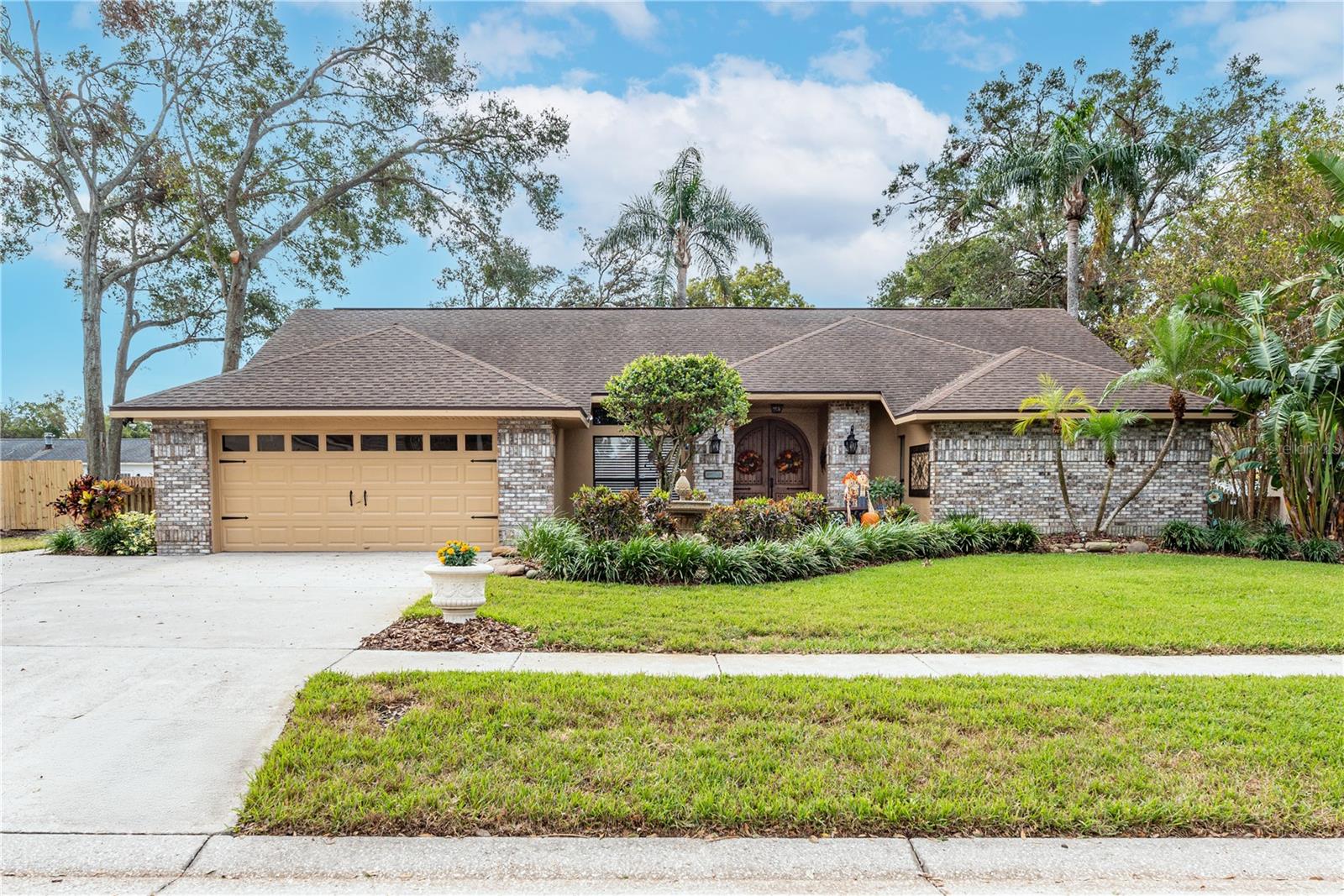 2,500 Sq ft, 4 spacious bedrooms, 2 bathrooms, a 2-car garage, and a stunning pool nestled on an expansive lot over a third of an acre.