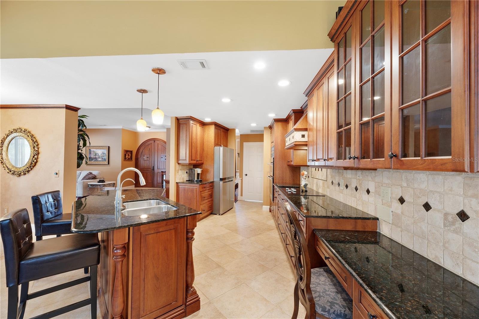 End panels on kitchen island are working cabinets as well.