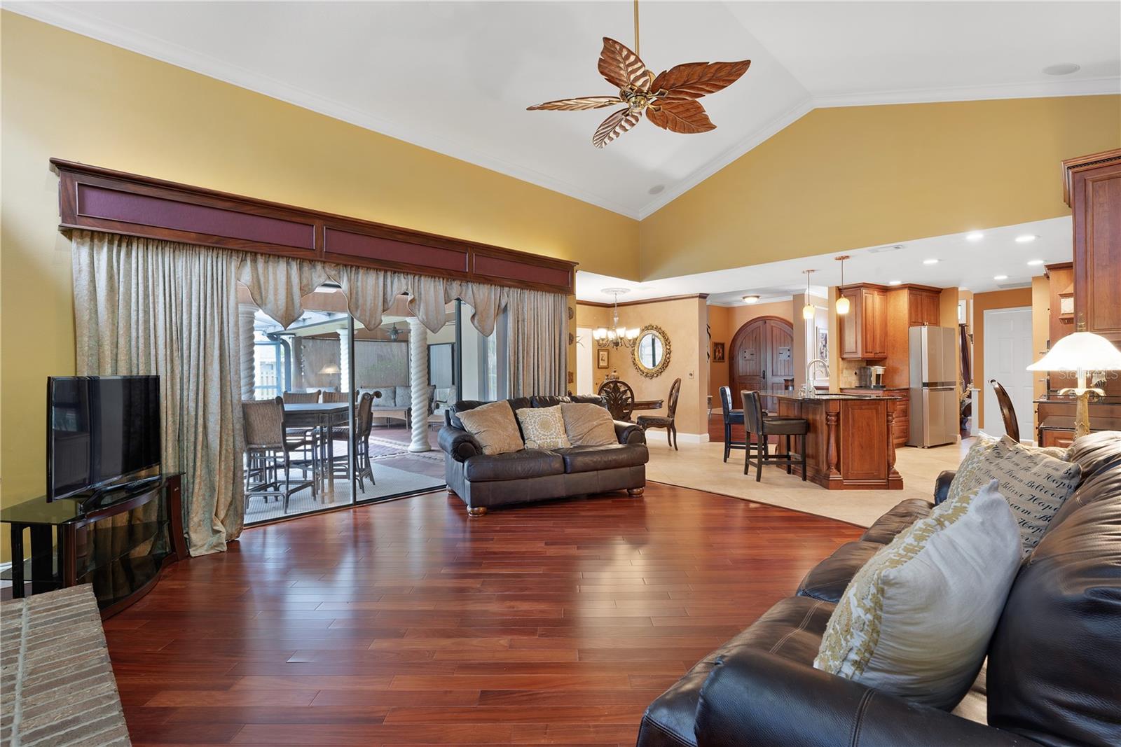 View of home from family room fireplace wall.  Additional sliders lead from family room to patio.