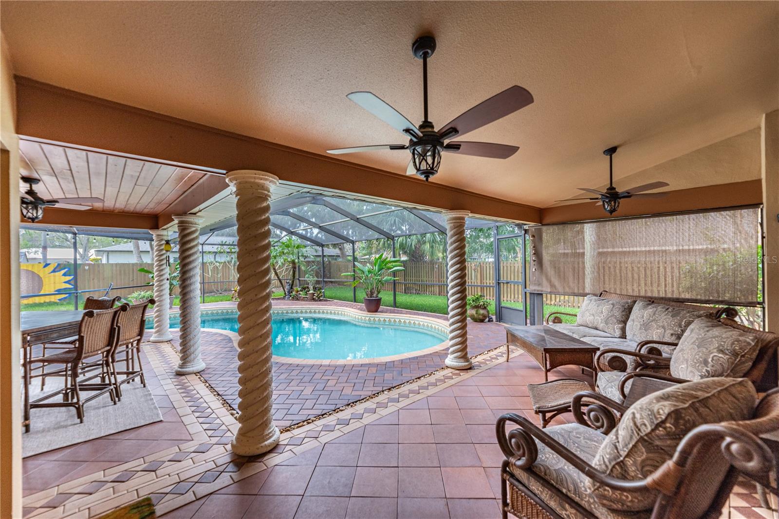 Large covered patio area outside of Living room and Owner's Suite.