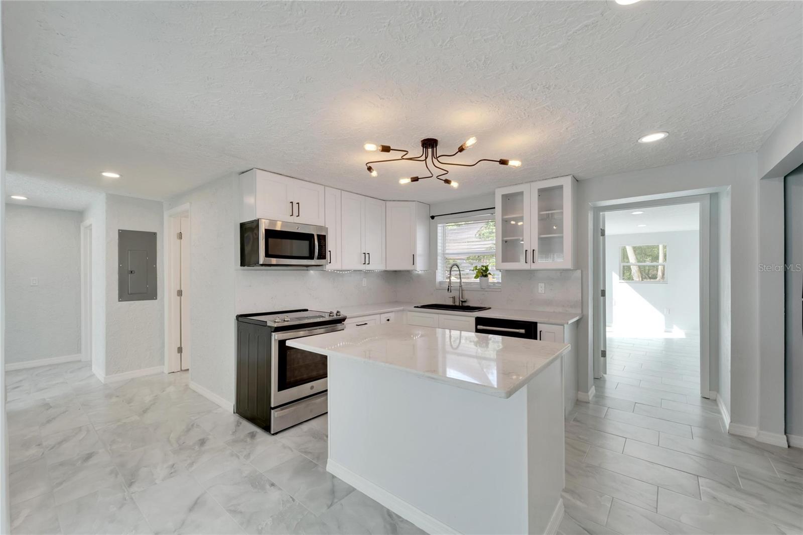 Kitchen with entry to the master en-suite.