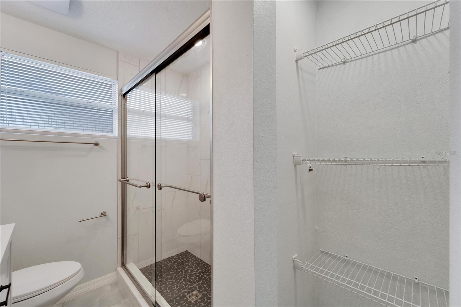 2nd bathroom with new shower and vanity.