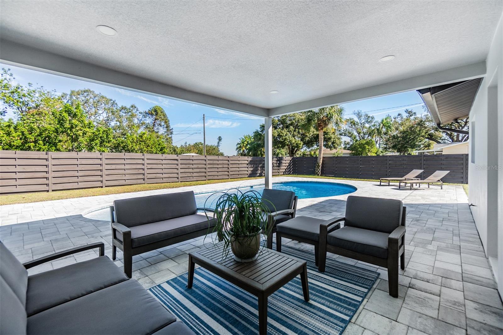 Covered rear patio / pool area