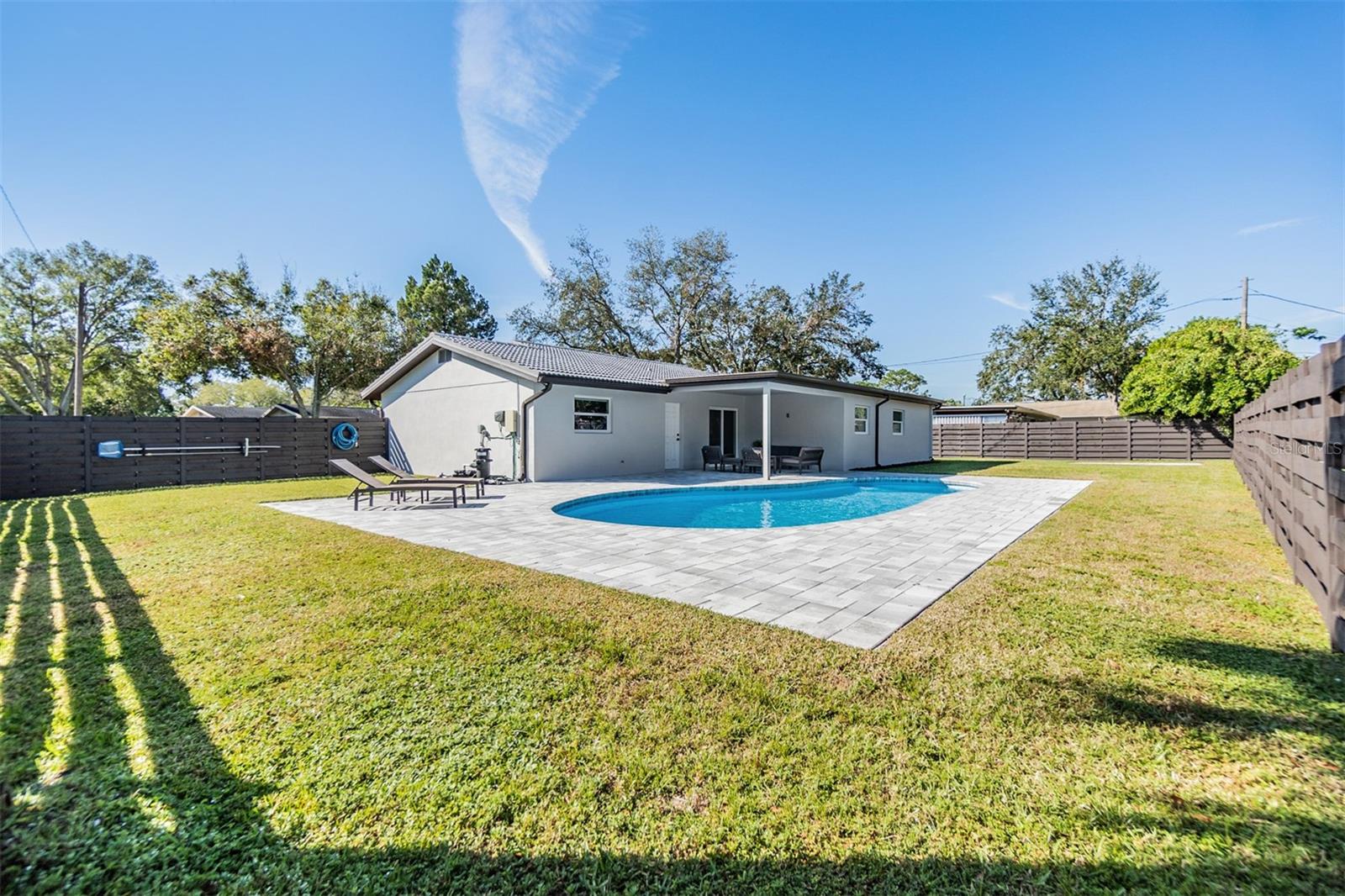 Completely fenced backyard