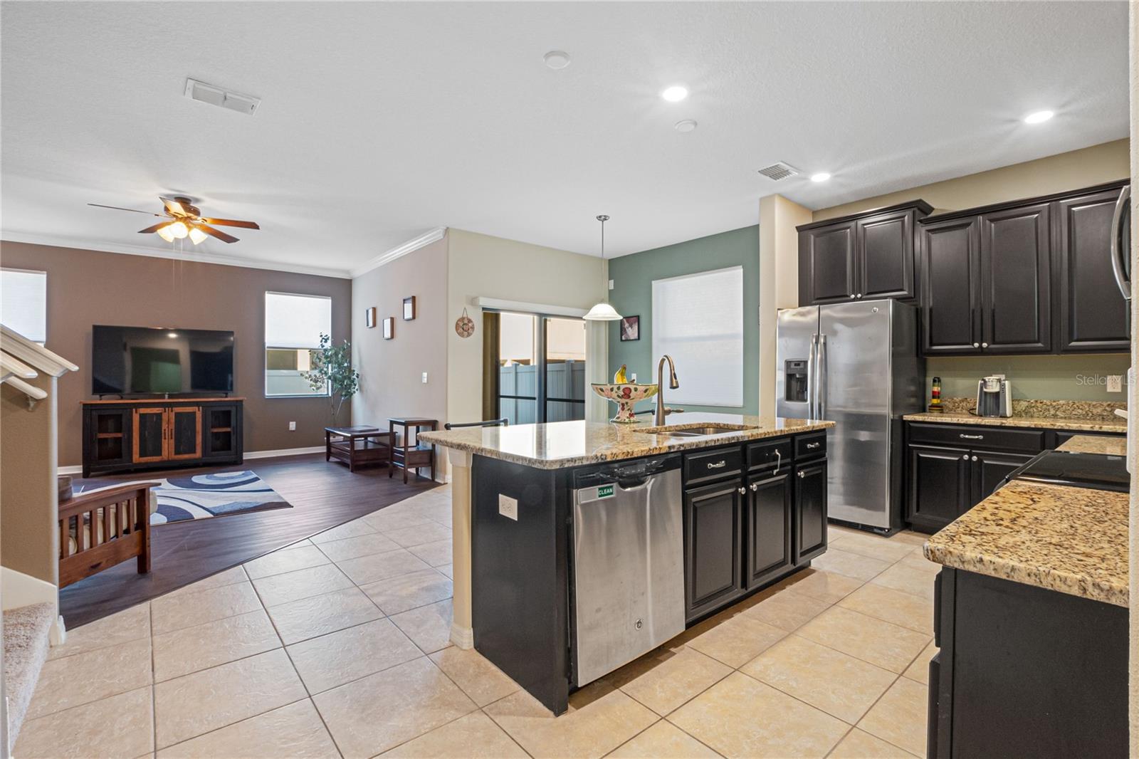 Kitchen overlooking living room.