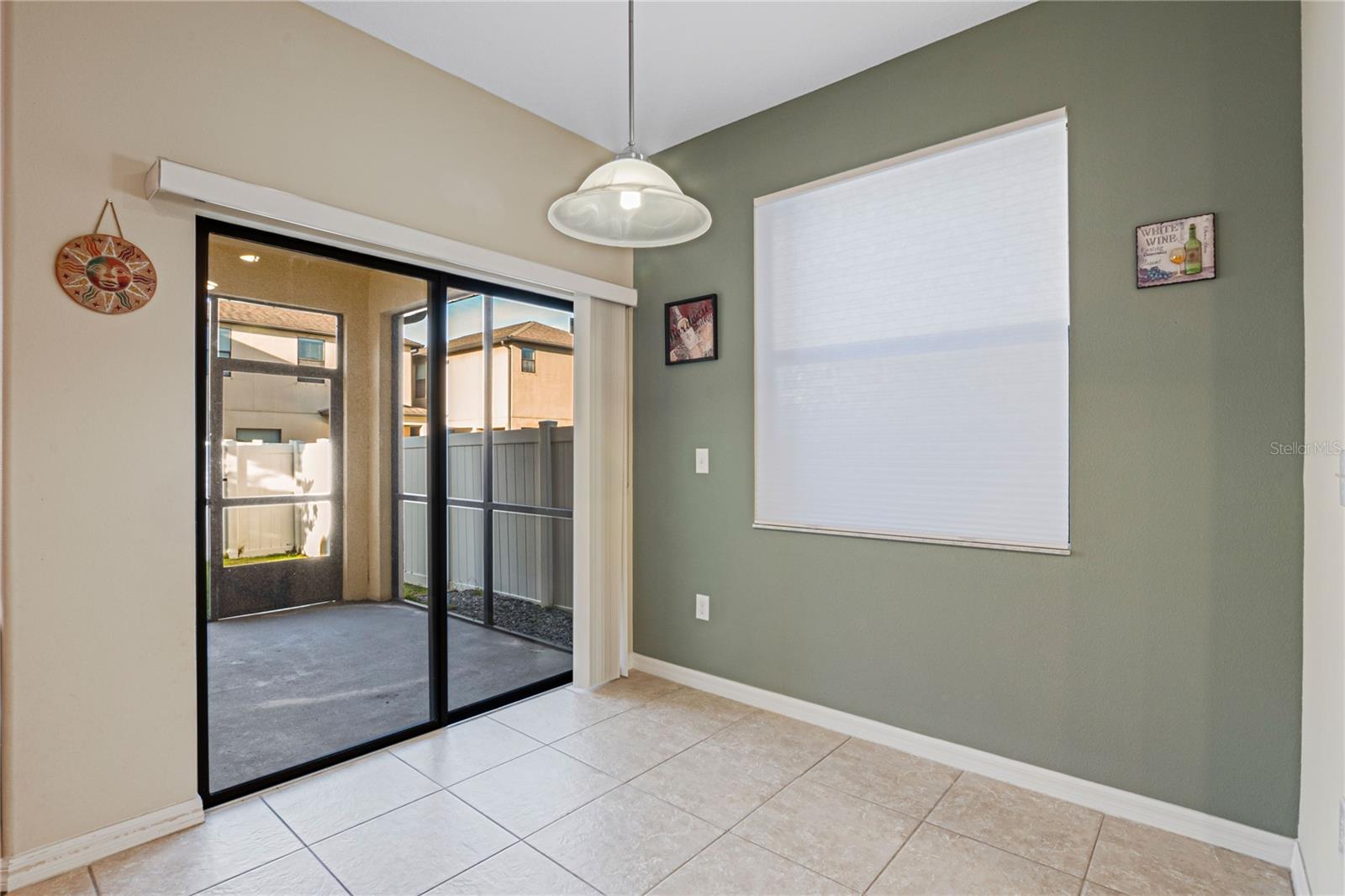 Breakfast nook with screened patio.