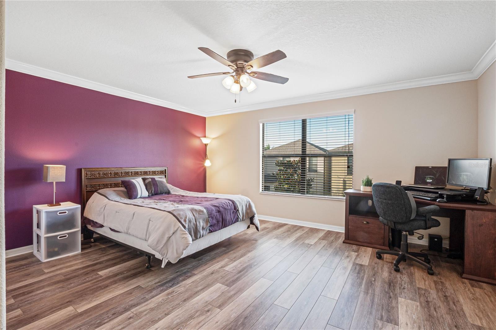 Primary Bedroom with luxury vinyl flooring.