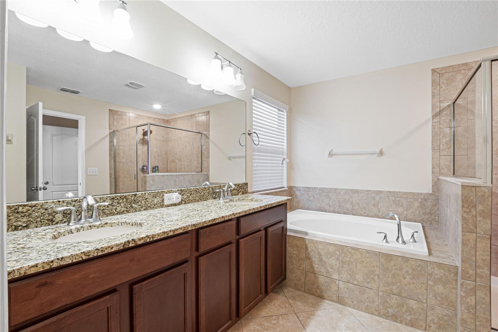 Primary bathroom with garden tub and his and her sinks!