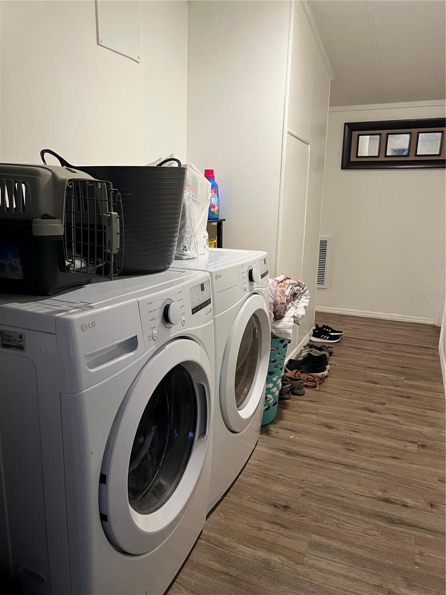 Laundry area, washer & dryer convey.