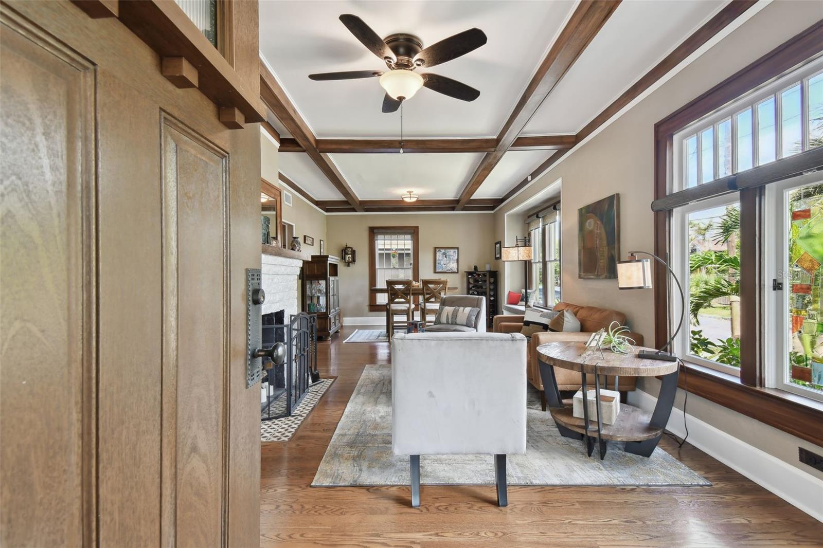 Step in front the front door greeted with gleaming refinished hard wood floors.