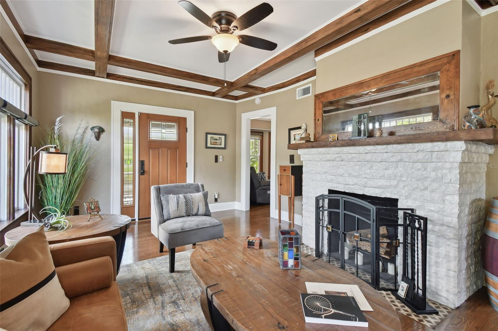 Unique wood burning fireplace with original Cuban tile.