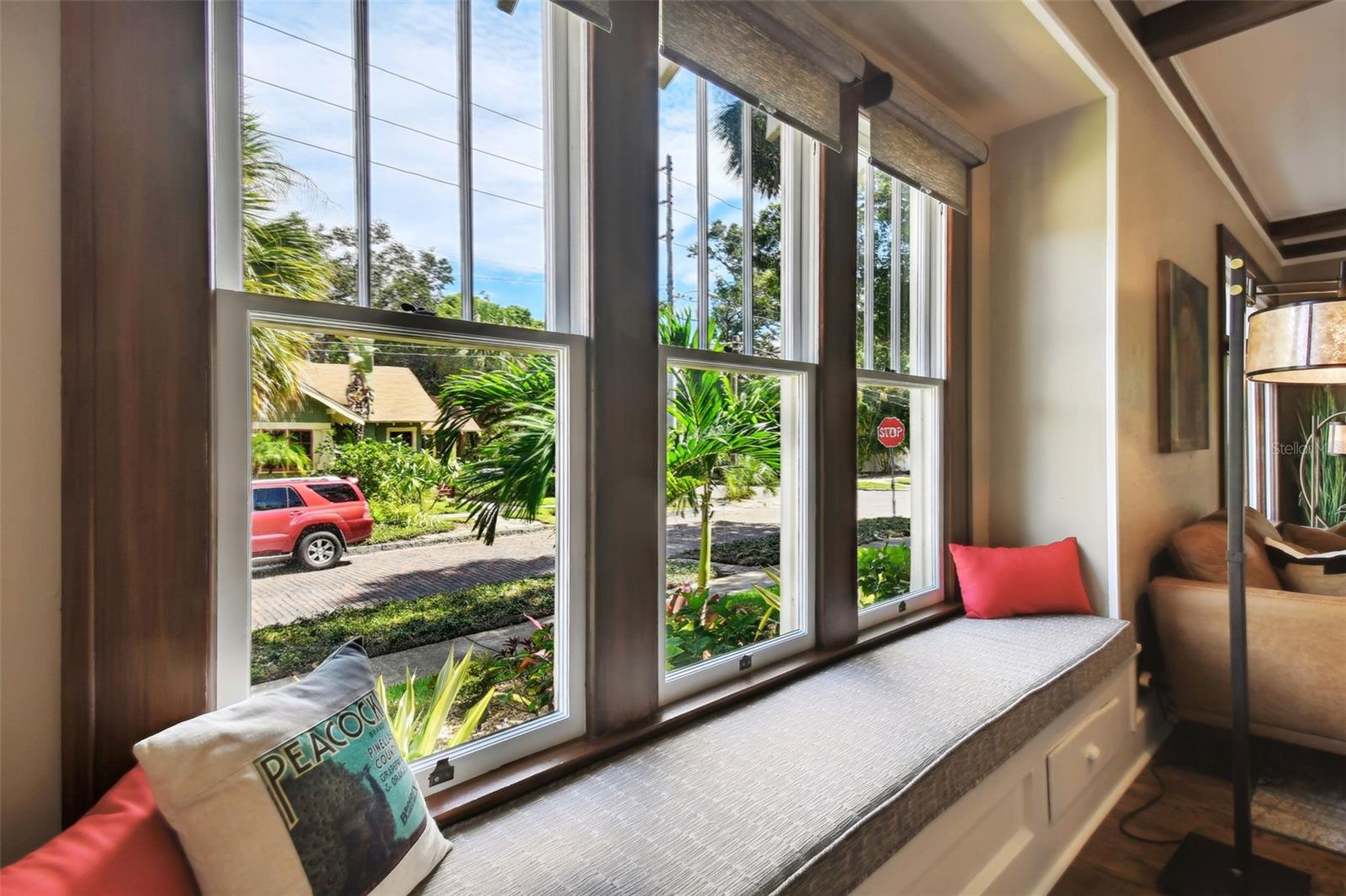 Custom window bench seating and original storage underneath.