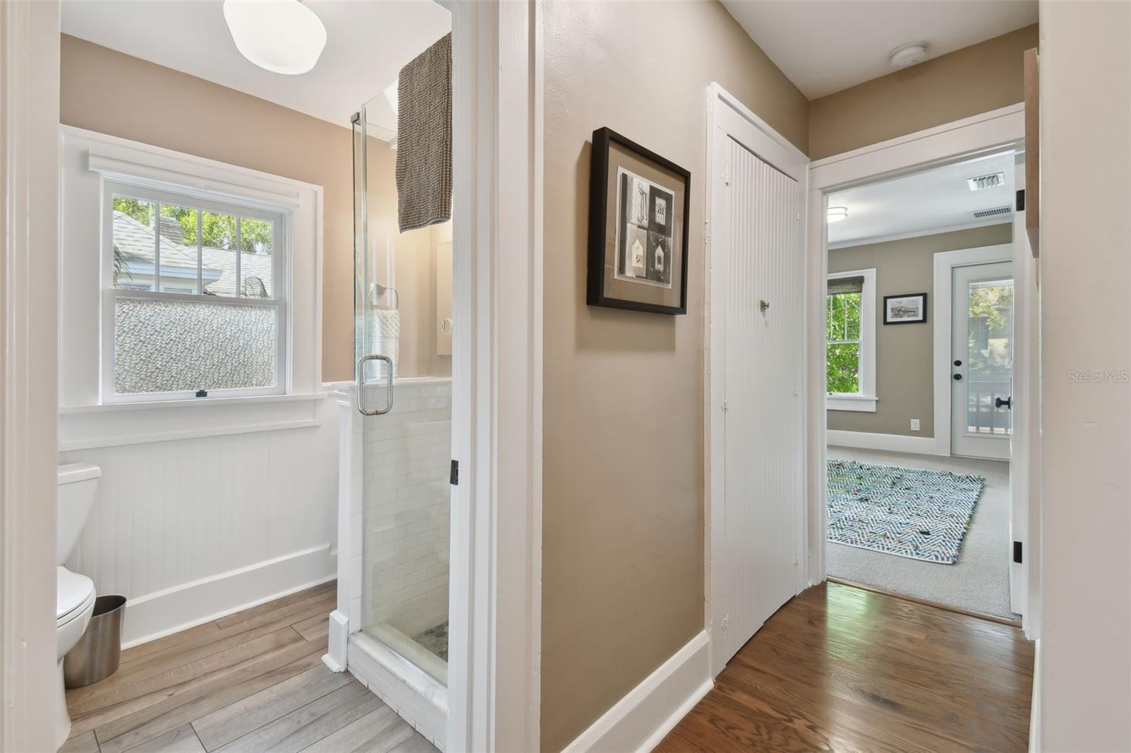 Step inside upstairs bathroom with walk in shower