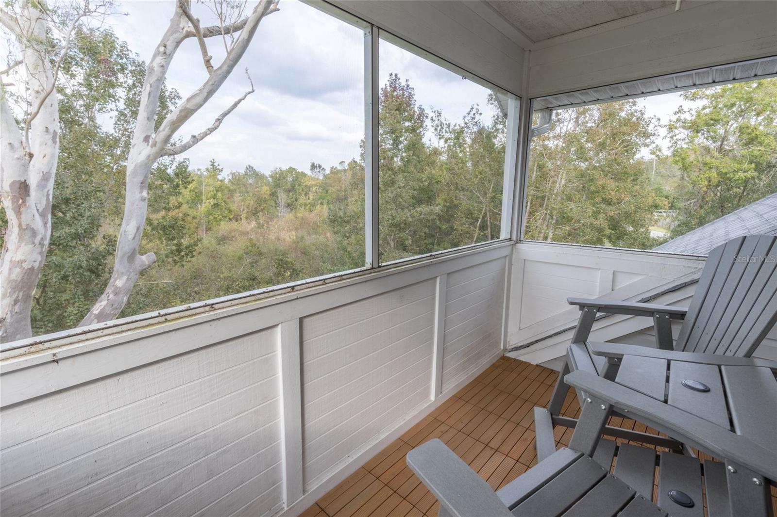 Primary Bedroom' Private Screened Balcony