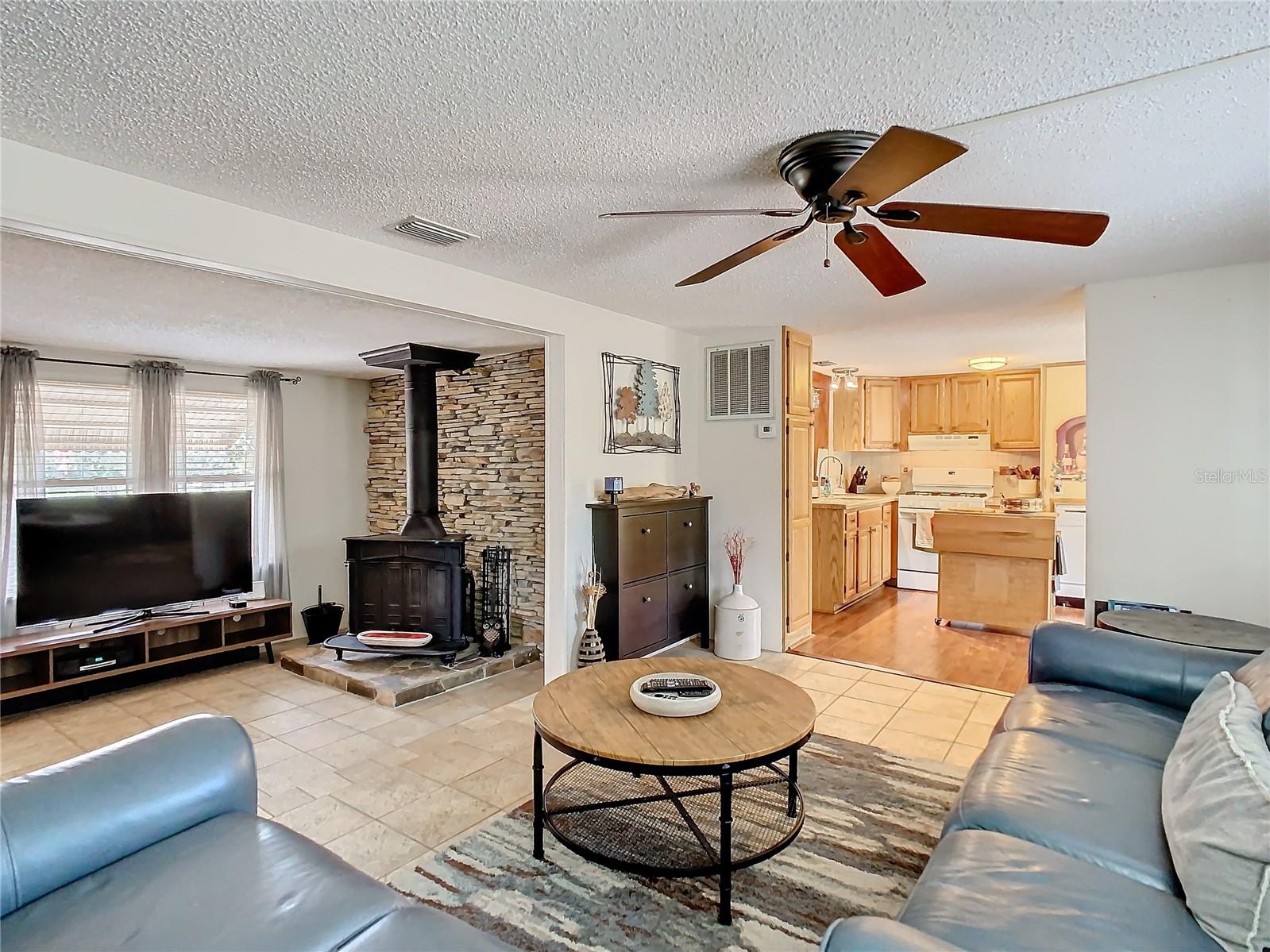 Living/family room looking towards foyer and kitchen